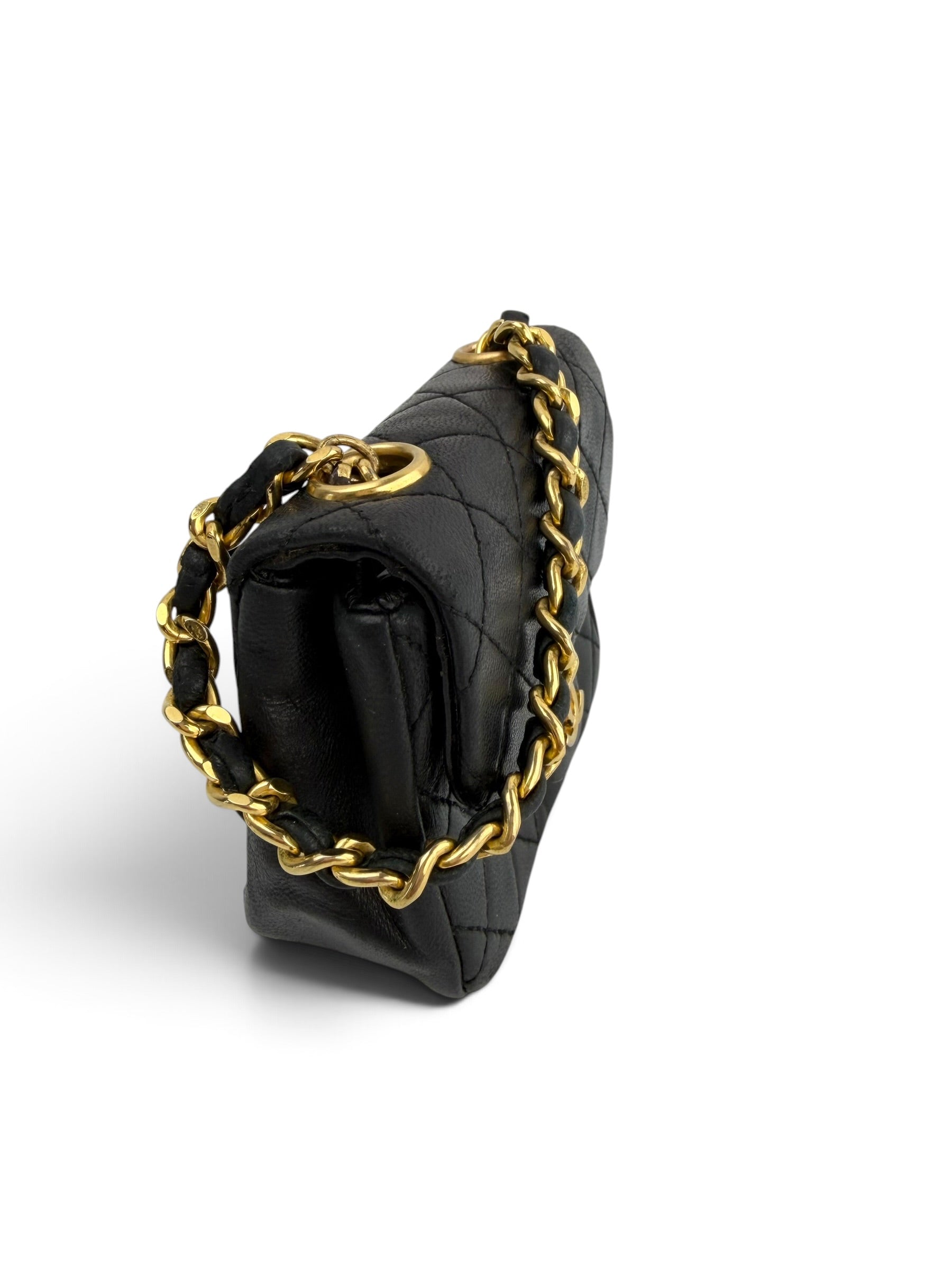chanel-black-lambskin-micro-flap-bag-1