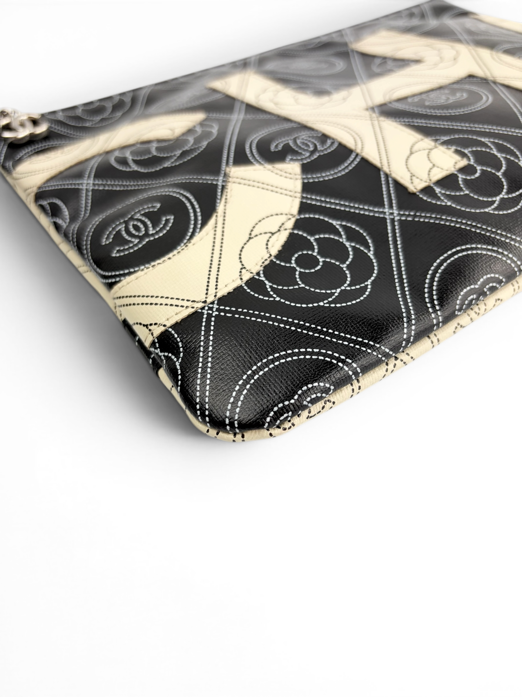 chanel-coated-calfskin-camellia-printed-zip-wristlet-2