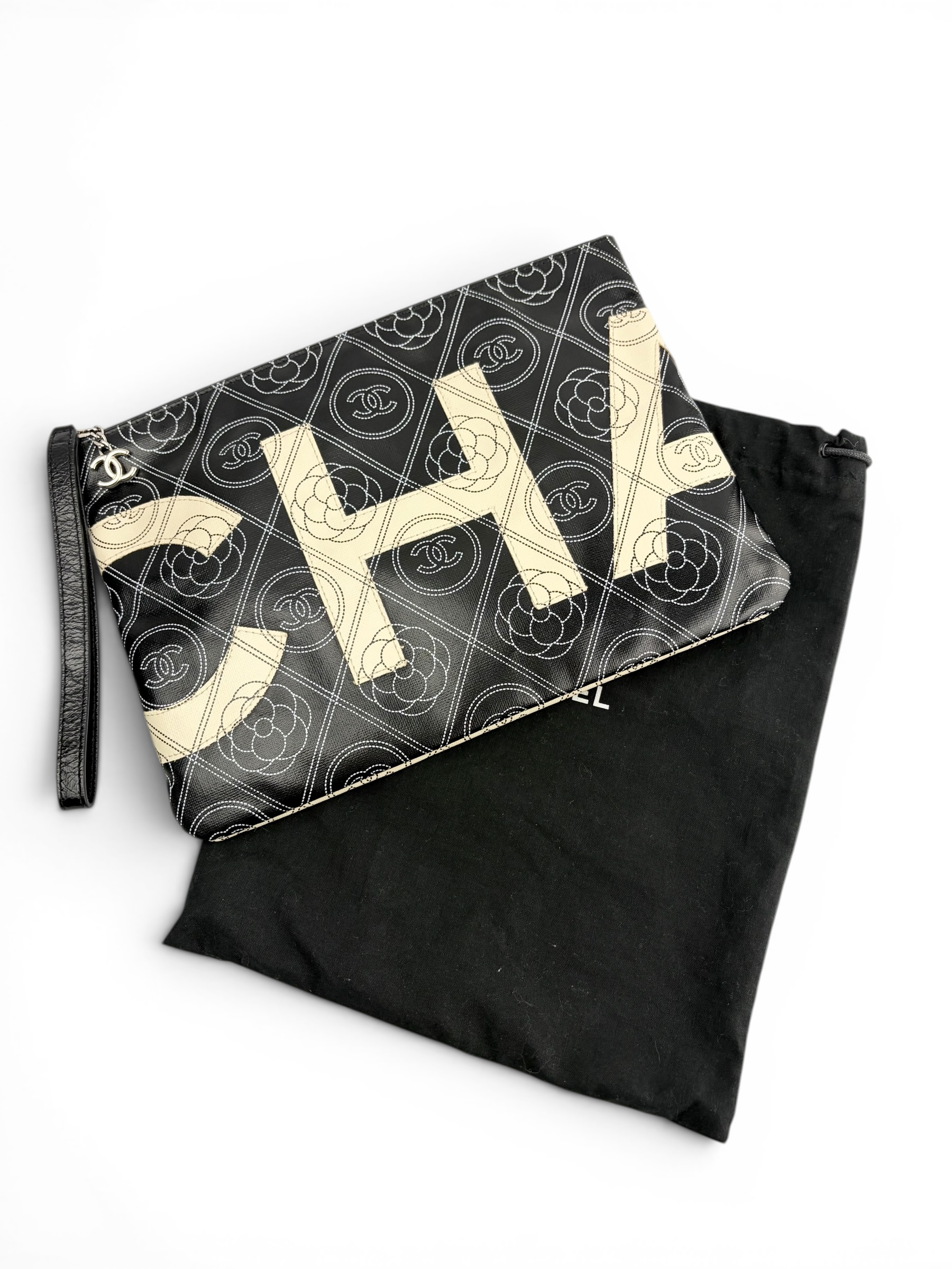 chanel-coated-calfskin-camellia-printed-zip-wristlet-1