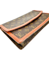 Louis Vuitton Monogram Coated Canvas Dame GM Clutch