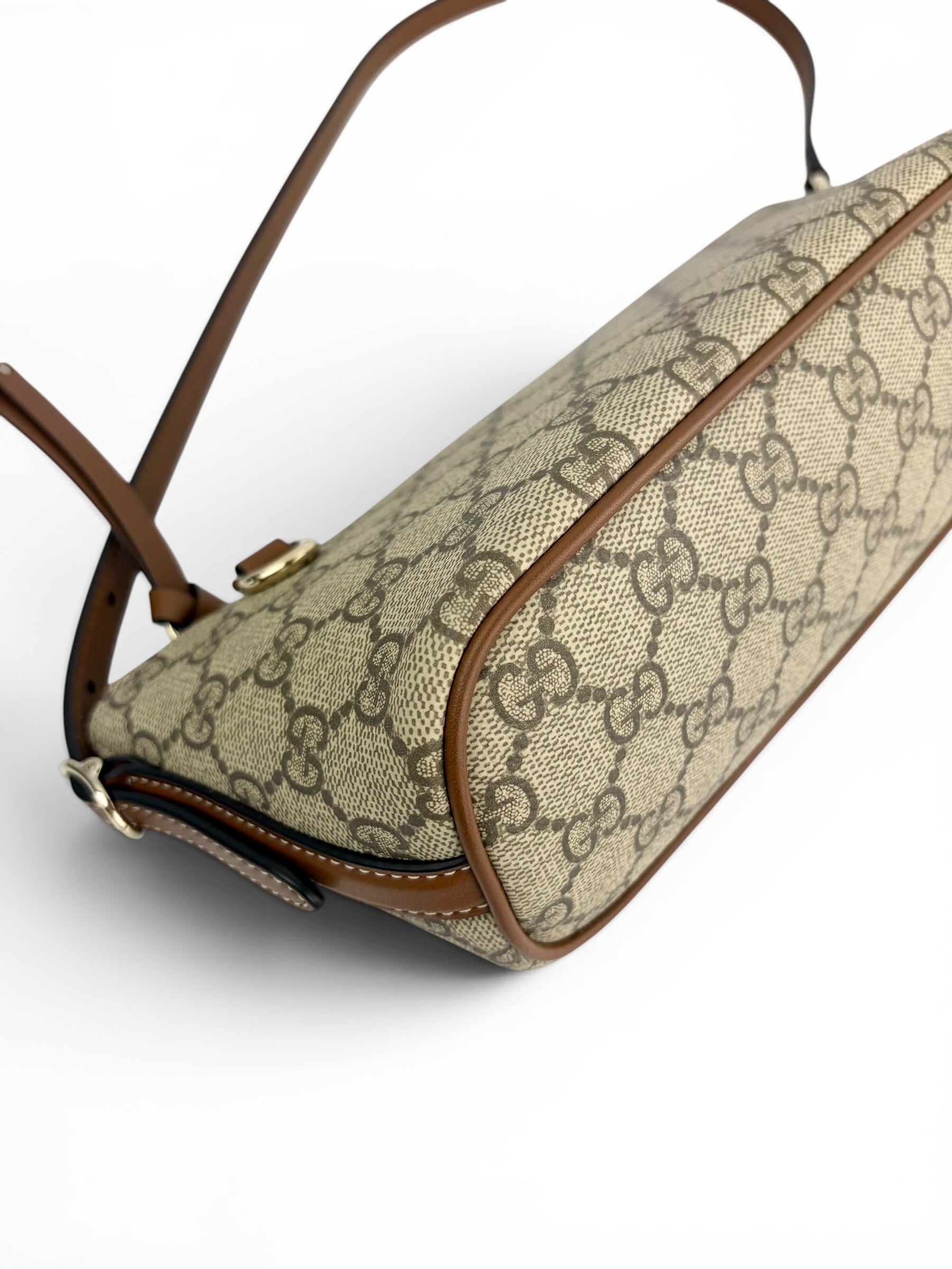 gucci-supreme-monogram-boat-pochette-new-model-7