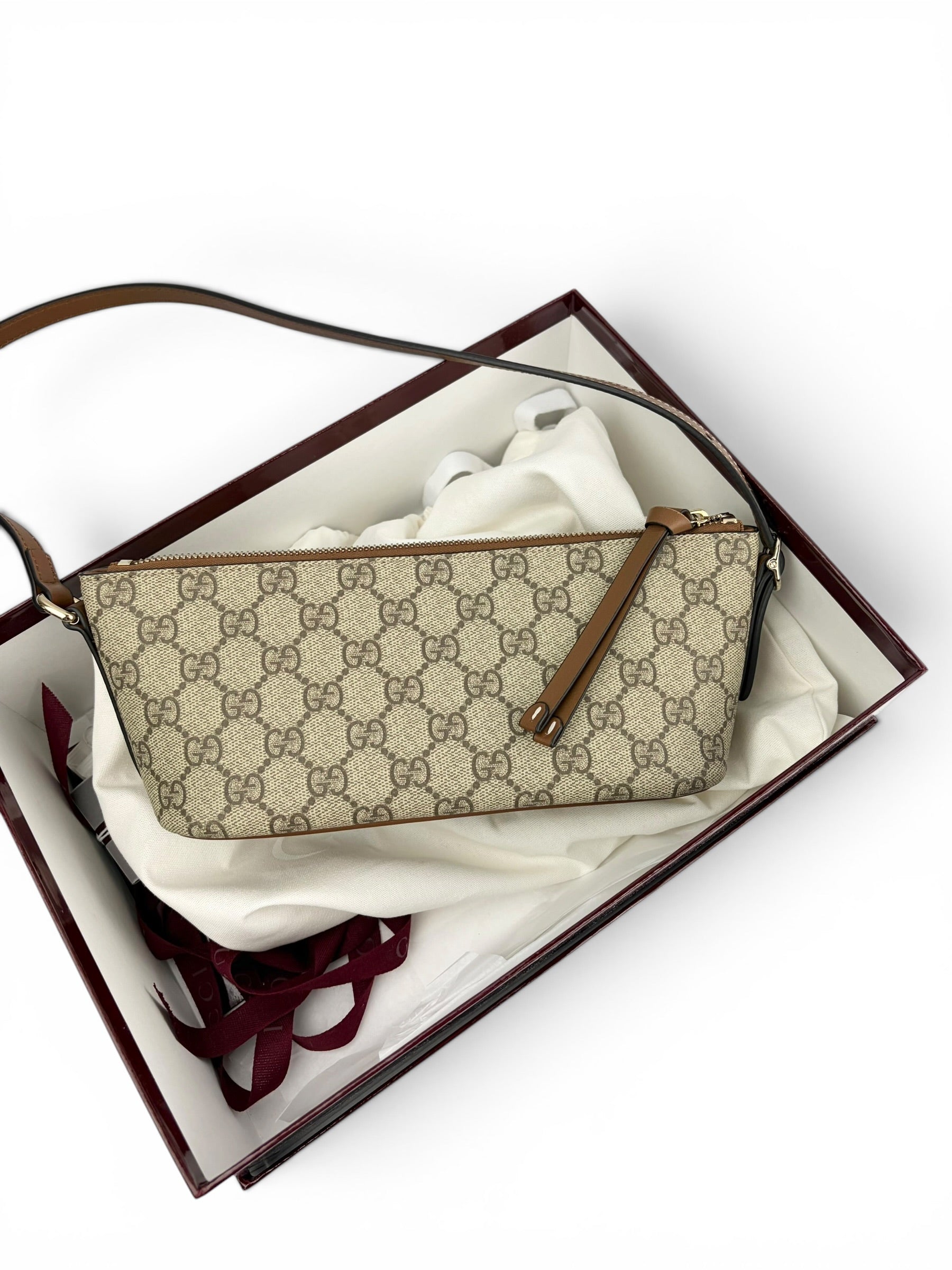 gucci-supreme-monogram-boat-pochette-new-model-1