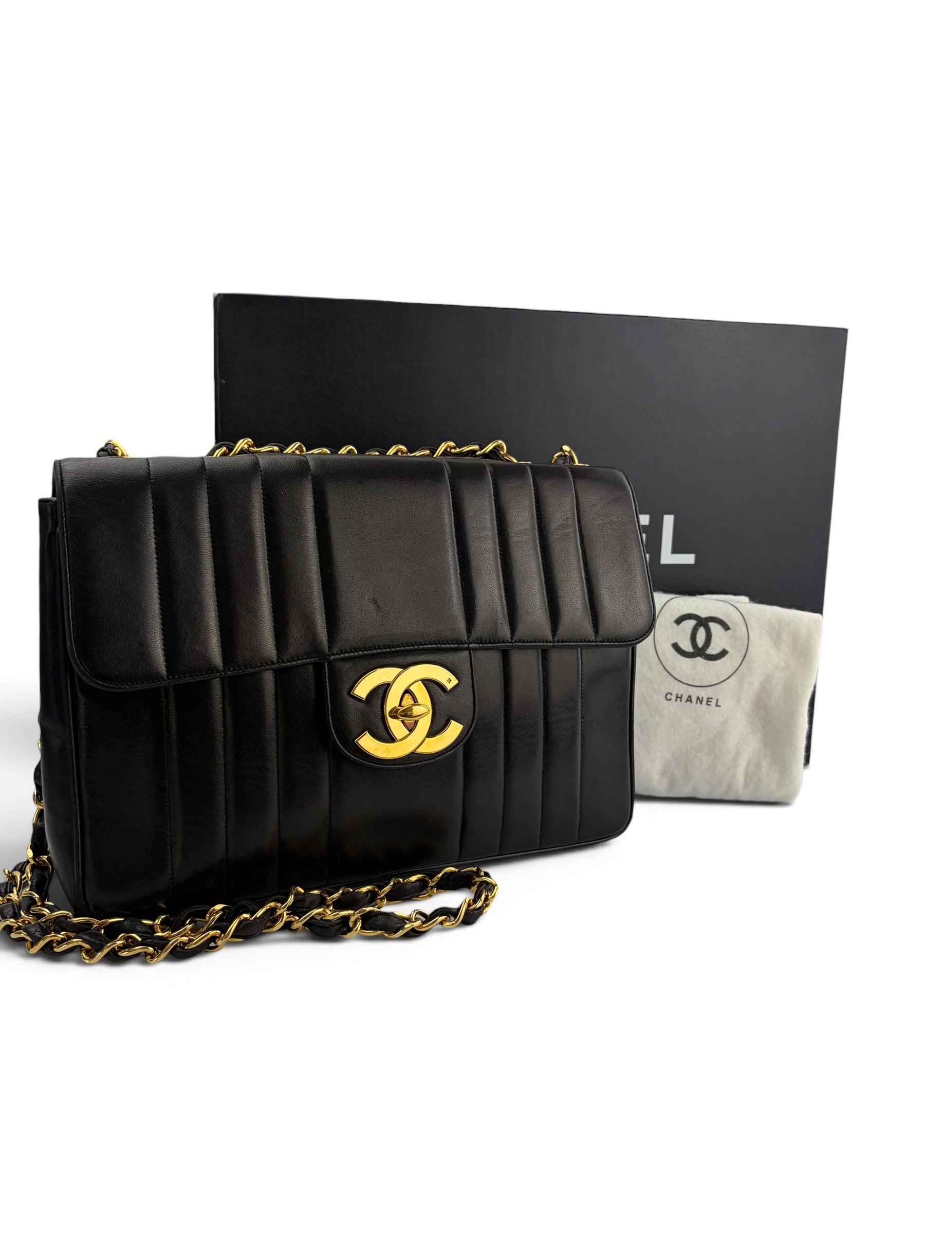 chanel-vintage-vertical-black-lambskin-maxi-flap-1