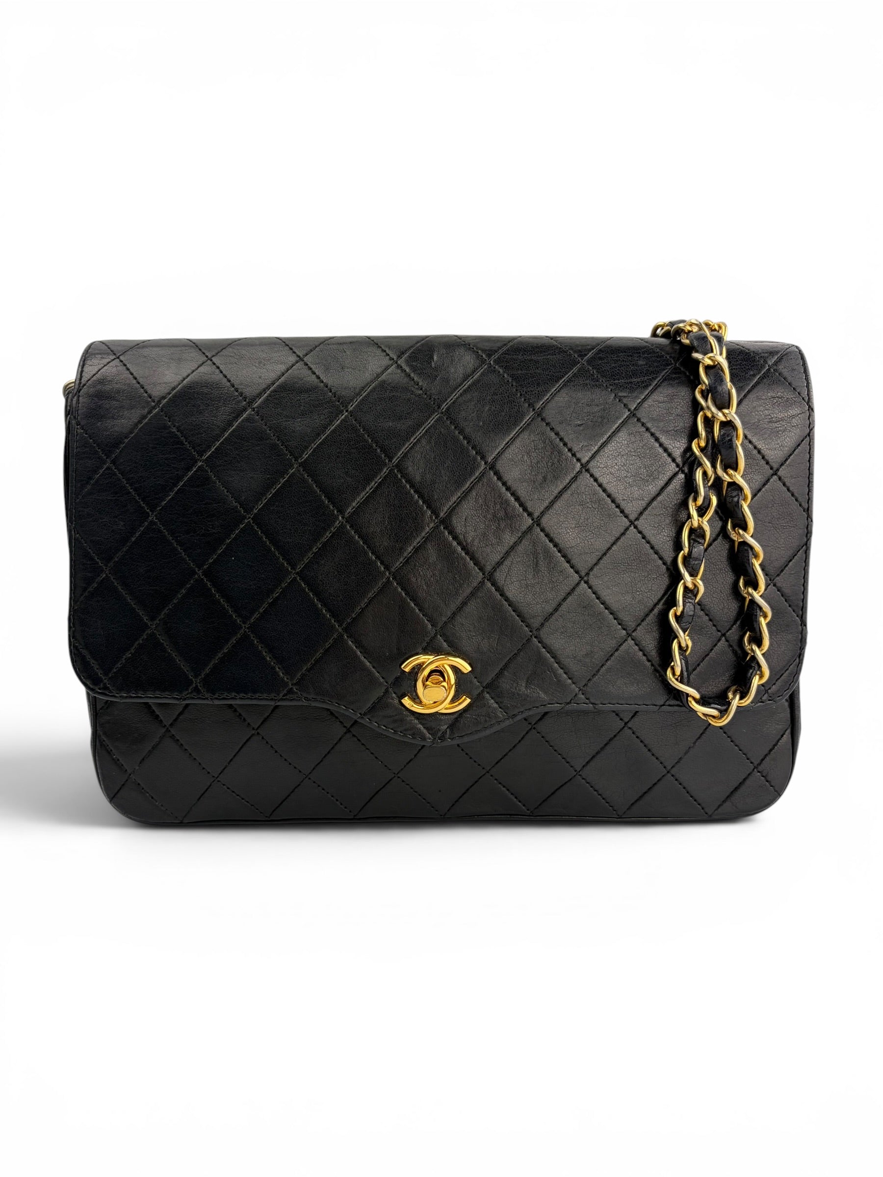 chanel-vintage-black-lambskin-flap-0