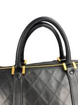 Chanel Vintage Black Leather Quilted Duffle Bag