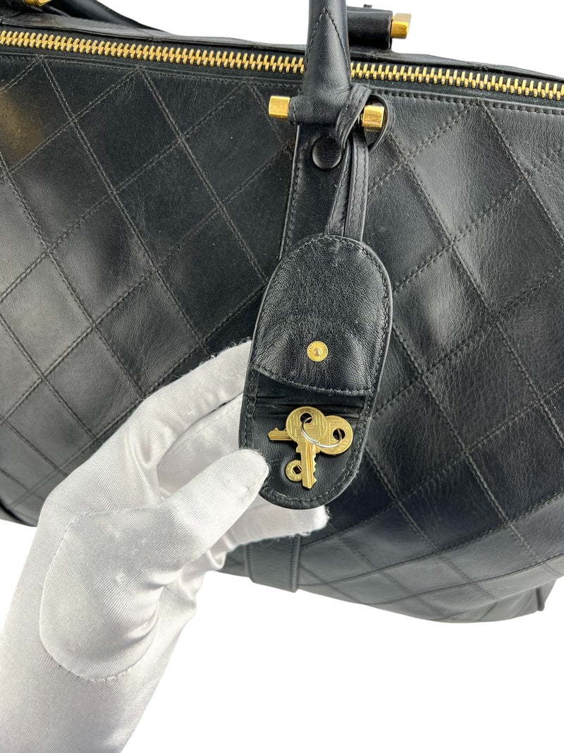 Chanel Vintage Black Leather Quilted Duffle Bag