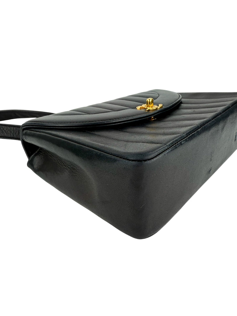 Chanel Black Vertical Quilted Handle Bag